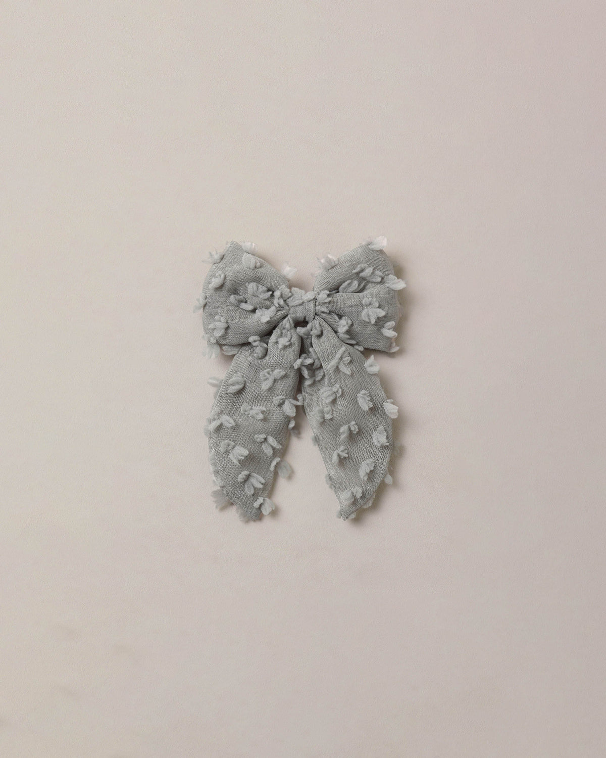 Eucalyptus Everly Bow hair accessory by Noralee featuring a soft, green eucalyptus-themed bow for stylish hair decoration
