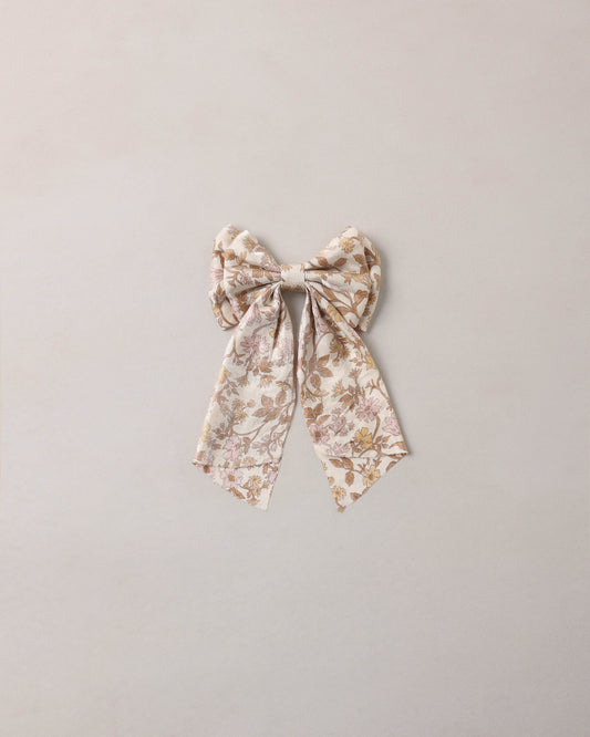 Noralee Wildflower Alice Bow, a colorful fabric hair accessory with floral patterns and a tied bow design.