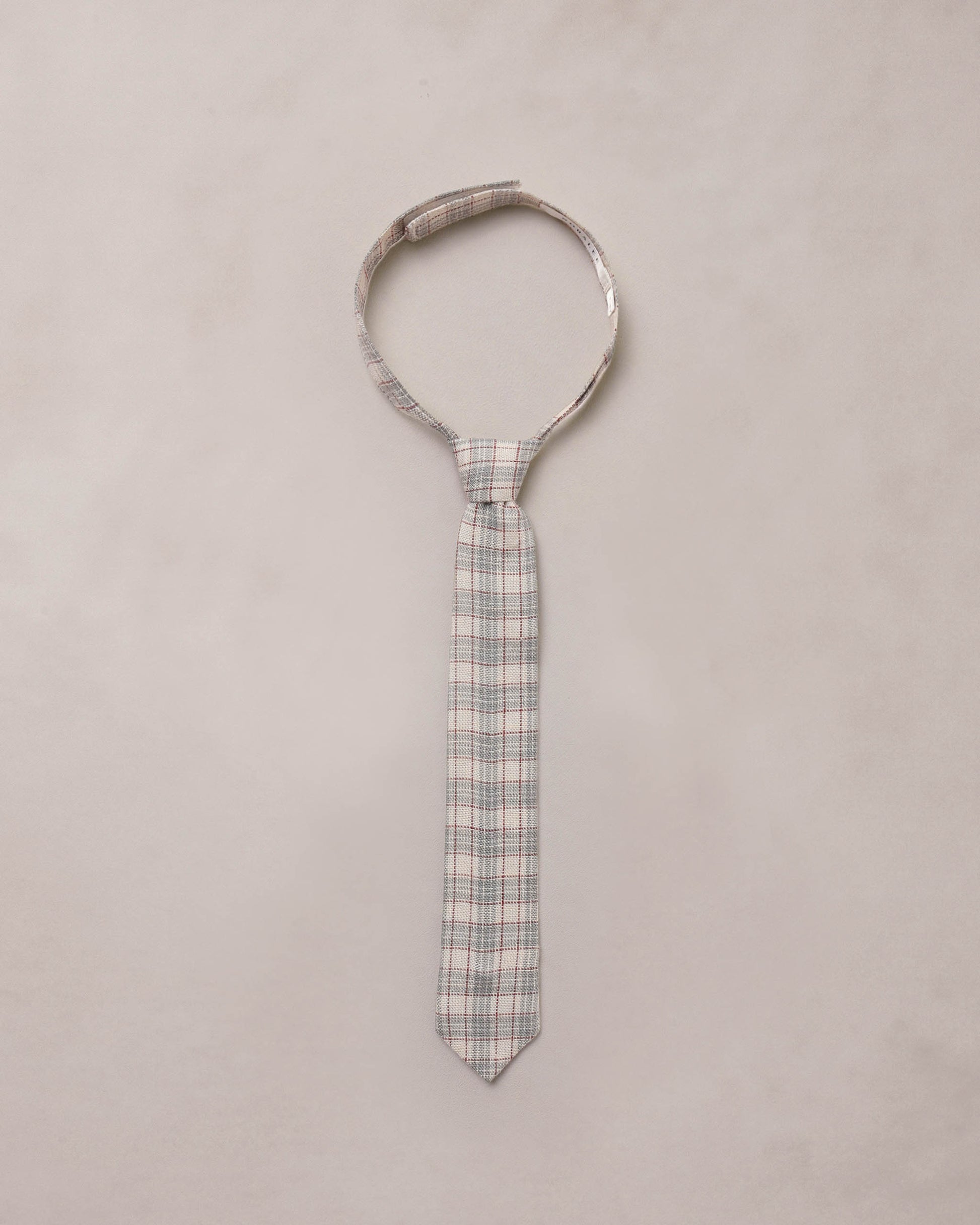 Noralee fall plaid skinny tie with red, black, and beige checkered pattern, stylish accessory for men or women.