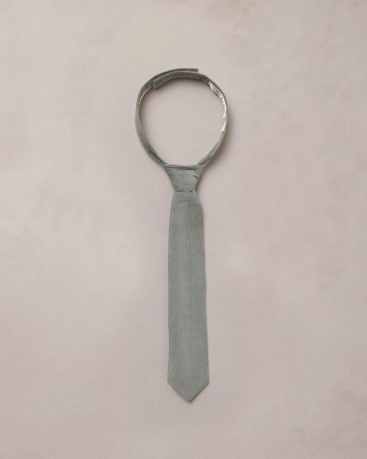 Noralee eucalyptus skinny tie featuring a sleek design with a botanical eucalyptus pattern on smooth fabric.