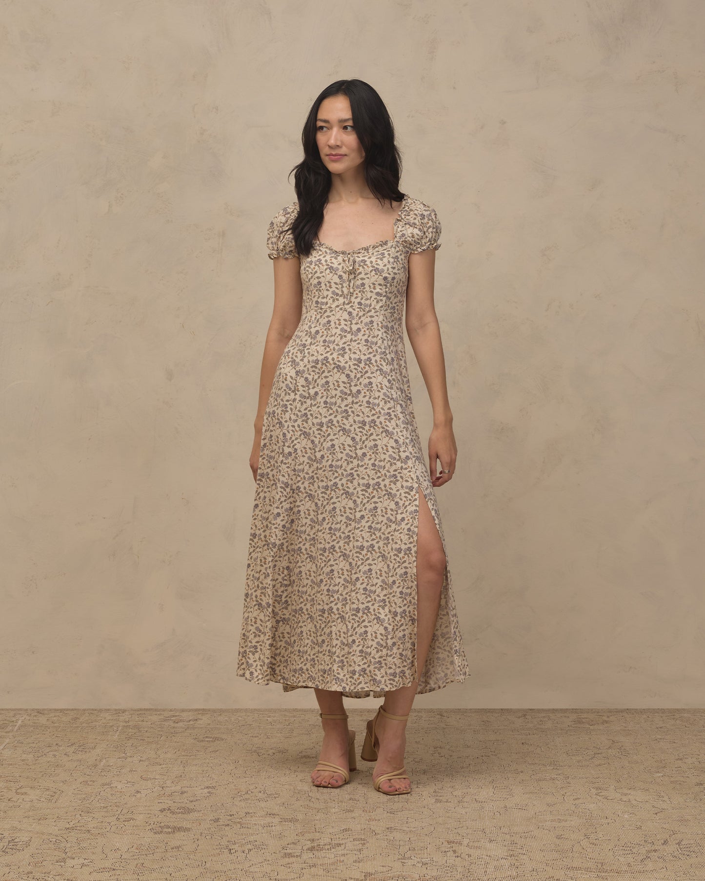 Women's blue Garden Nancy dress by Noralee, featuring floral pattern and lightweight fabric, displayed on a hanger.