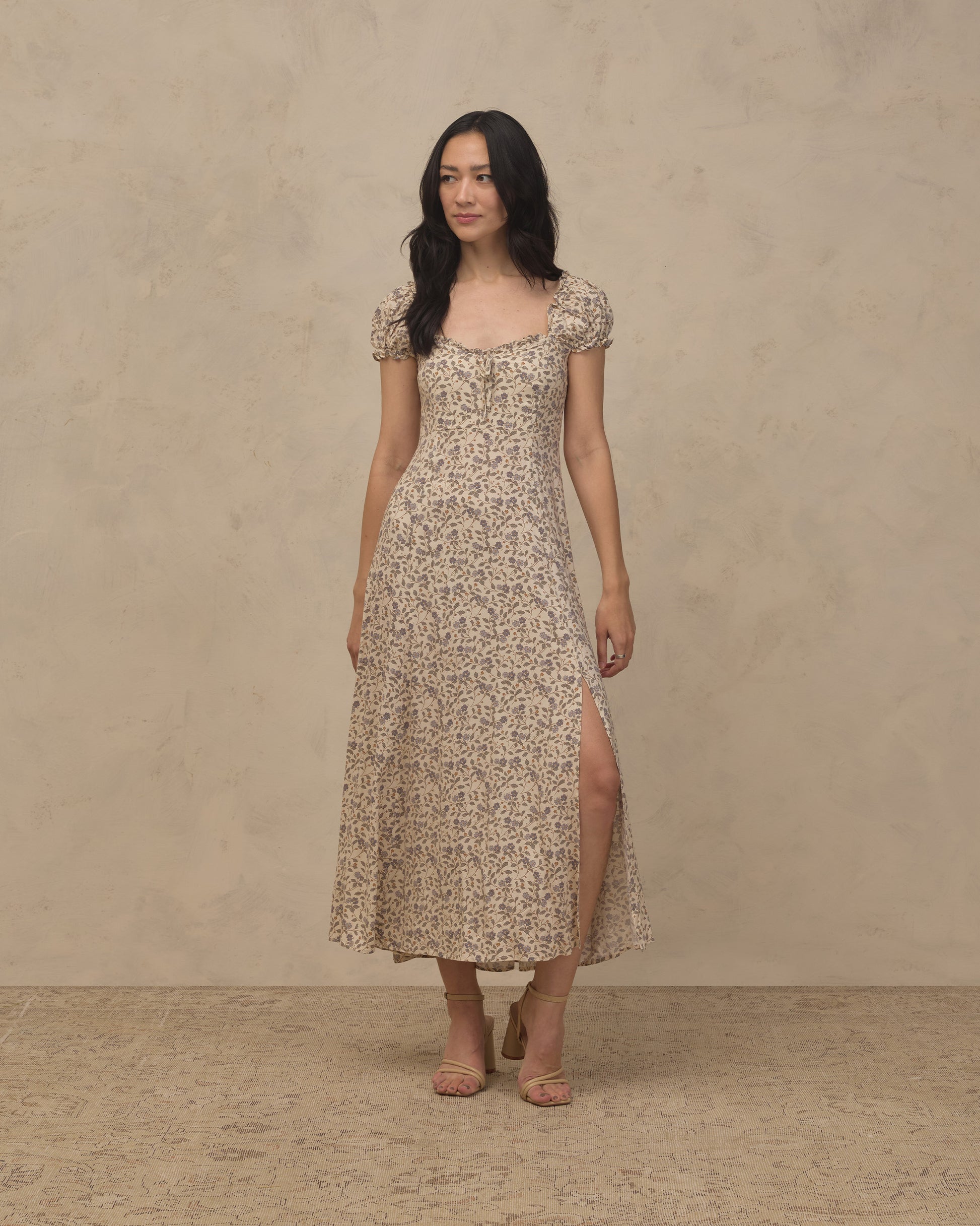 Women's blue Garden Nancy dress by Noralee, featuring floral pattern and lightweight fabric, displayed on a hanger.