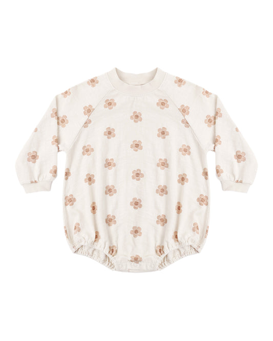 Pink daisies crew neck romper by Rylee & Cru featuring short sleeves, floral pattern, and a comfortable fit for young children.