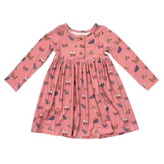 Babysprouts Butterflies Bloom Henley Twirl Dress featuring a floral butterfly pattern and a twirling skirt for little girls.