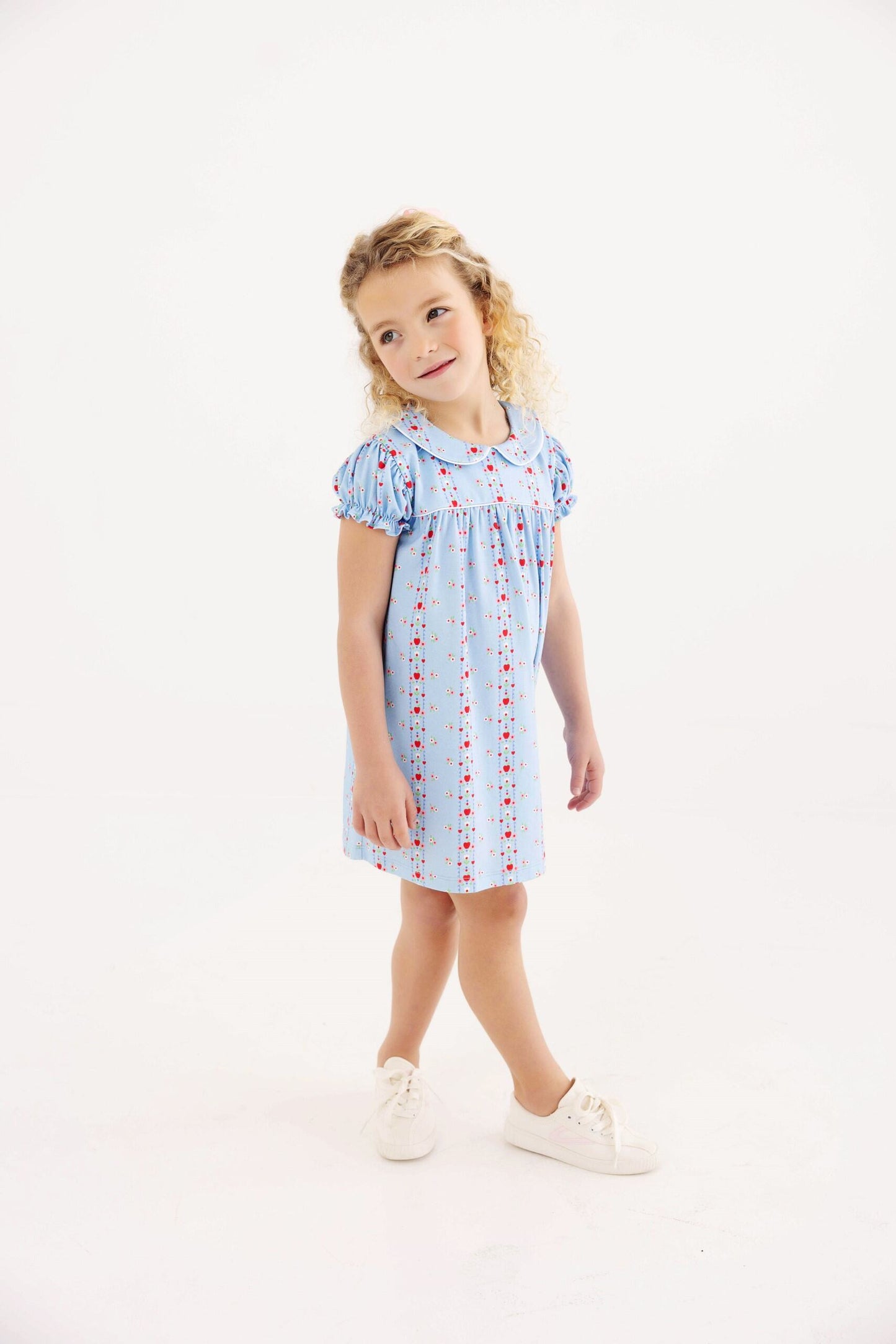 The Beaufort Bonnet Company First Day Flowers and Richmond Red Holly Day Dress with white and red floral pattern for girls.