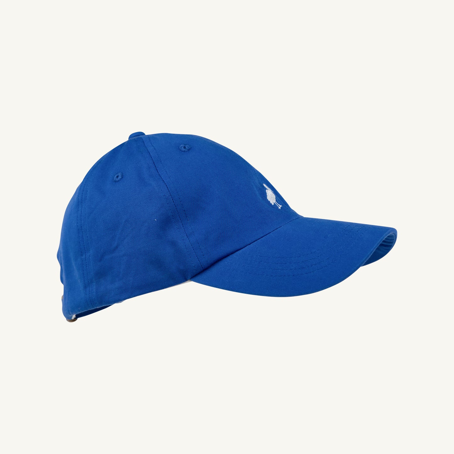 White Covington Cap from The Beaufort Bonnet Company featuring Rockefeller Royal and Worth Ave patterns.