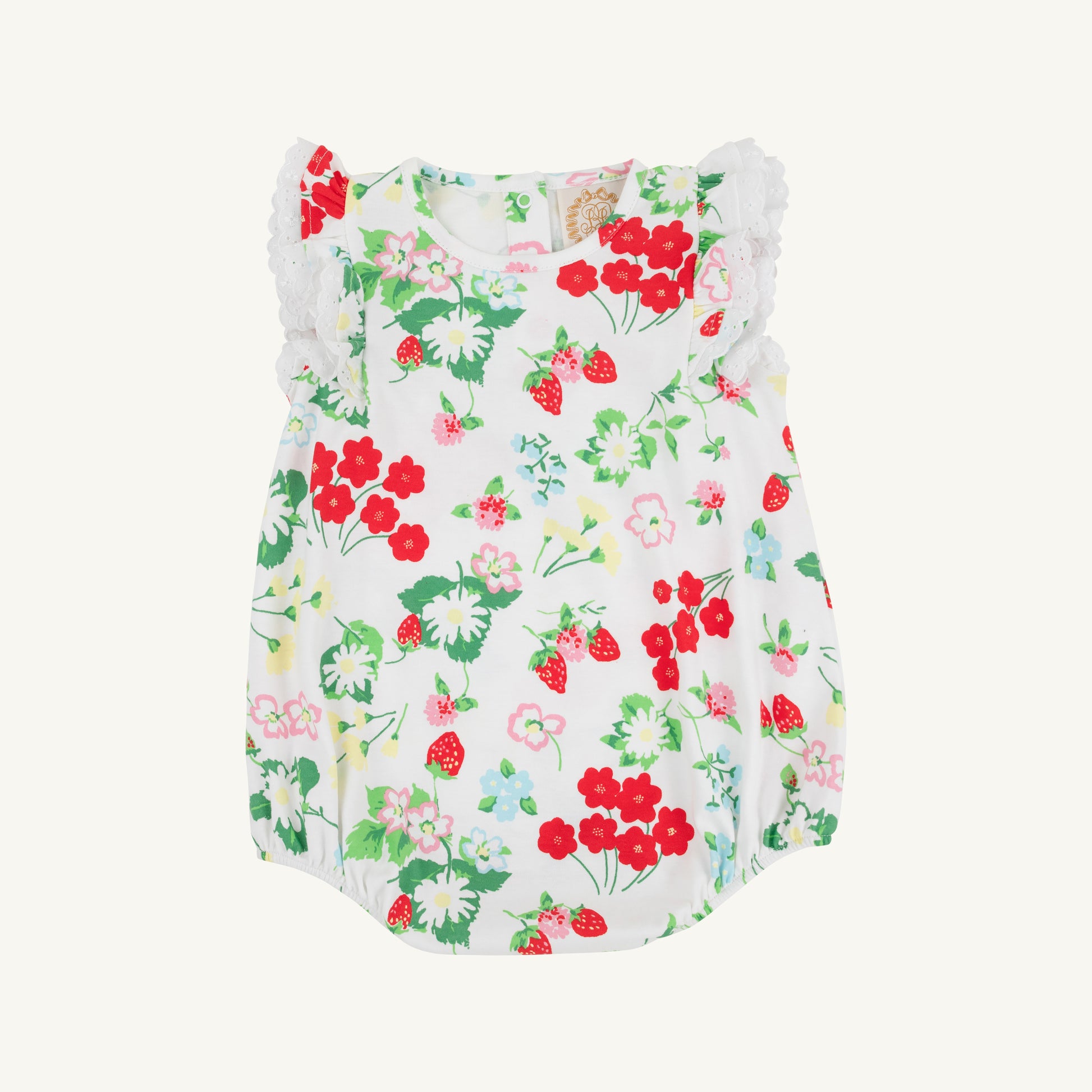White Ruehling Ruffle Bubble dress by The Beaufort Bonnet Company featuring berry sweet pattern and ruffle details for girls.
