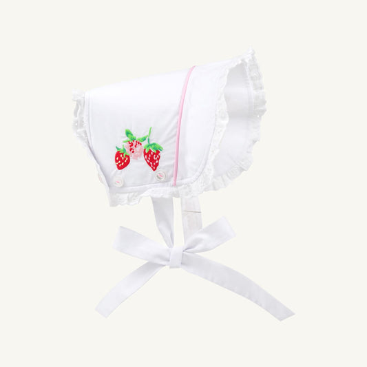 White and pink Catesby Country Club bonnet by The Beaufort Bonnet Company featuring a strawberry pattern and soft fabric.
