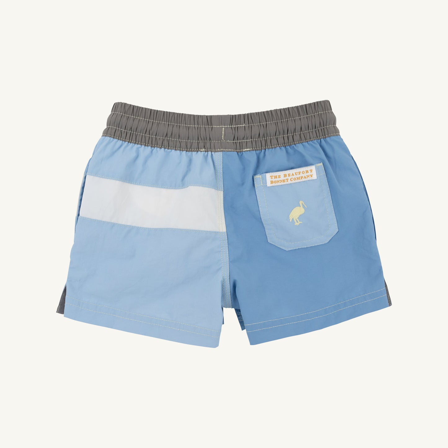 The Beaufort Bonnet Company colorblock trunk featuring Park City Periwinkle, Beale Street Blue, and Grantley Gray fabric details.