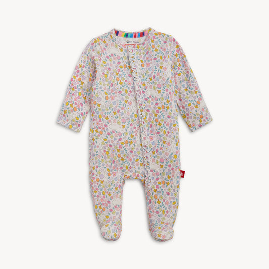 Magnetic Me Bunny Blossom modal ruffle footie for babies, featuring soft fabric, bunny print, and magnetic closures on a white background.