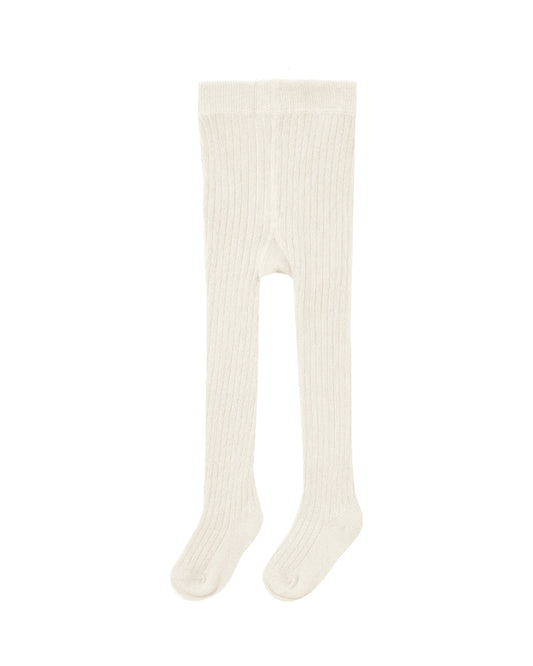 Natural Quincy Mae tights displayed on a model, showing soft, stretchy fabric and comfortable fit for everyday wear.