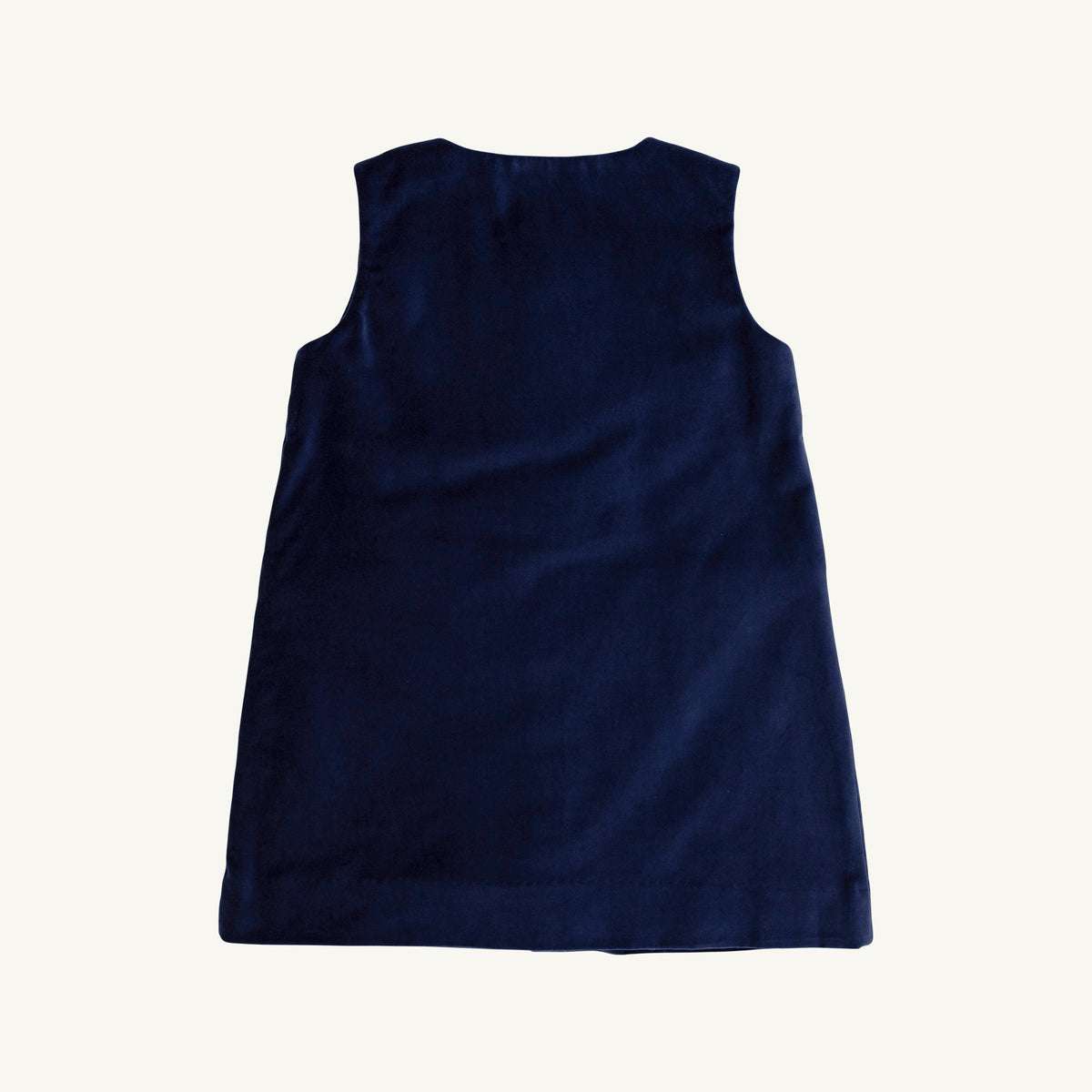 Nantucket Navy Jilly Jumper from The Beaufort Bonnet Company displayed on a child, featuring a navy knit design with cozy detailing.