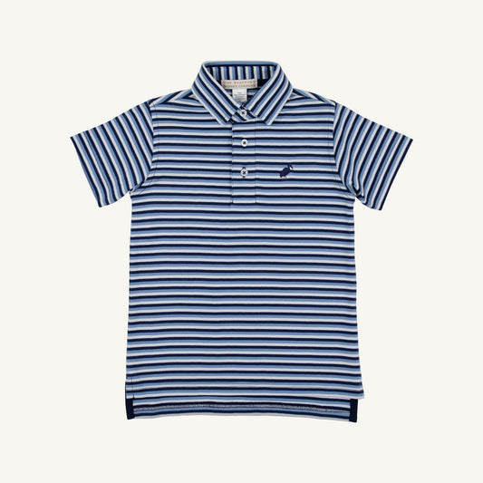 The Beaufort Bonnet Company Prim and Proper Polo featuring Sumner County Stripe in Barbados Blue and Nantucket Navy, styled on a child.