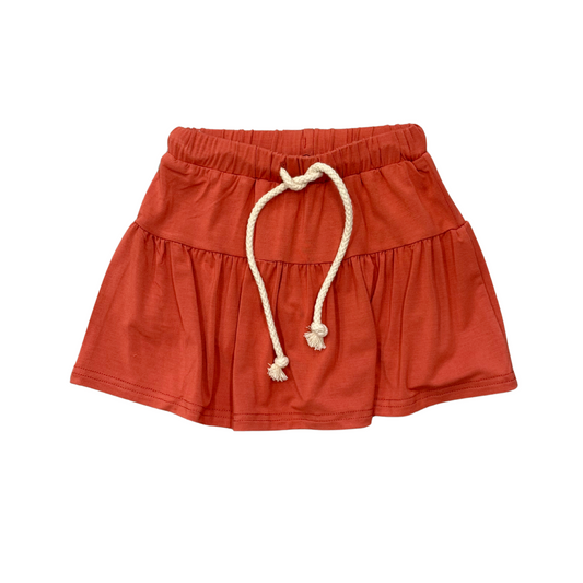 Baby girls' red skort from Babysprouts featuring a comfortable elastic waistband and a playful, casual style.