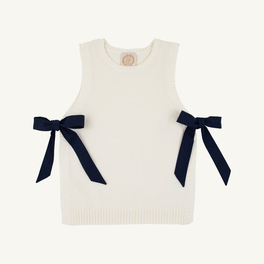 Nantucket Navy Shae sweater vest with palmetto pearl accents by The Beaufort Bonnet Company, shown on a model.