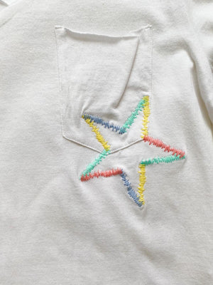 
            
                Load image into Gallery viewer, Paper Flower - Twisted Sleeve Slouchy Pocket Tee with Rainbow Embroidery Star
            
        