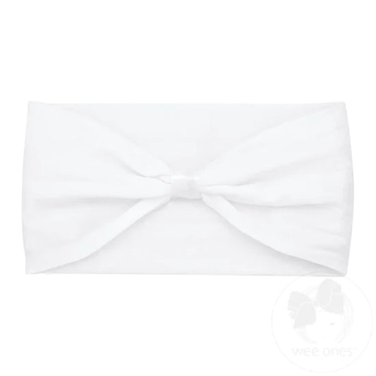 White nylon baby headband with wrap and space for adding a bow, designed for infants by wee ones.