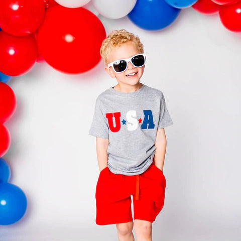 
            
                Load image into Gallery viewer, Sweet Wink - USA S/S Tee
            
        