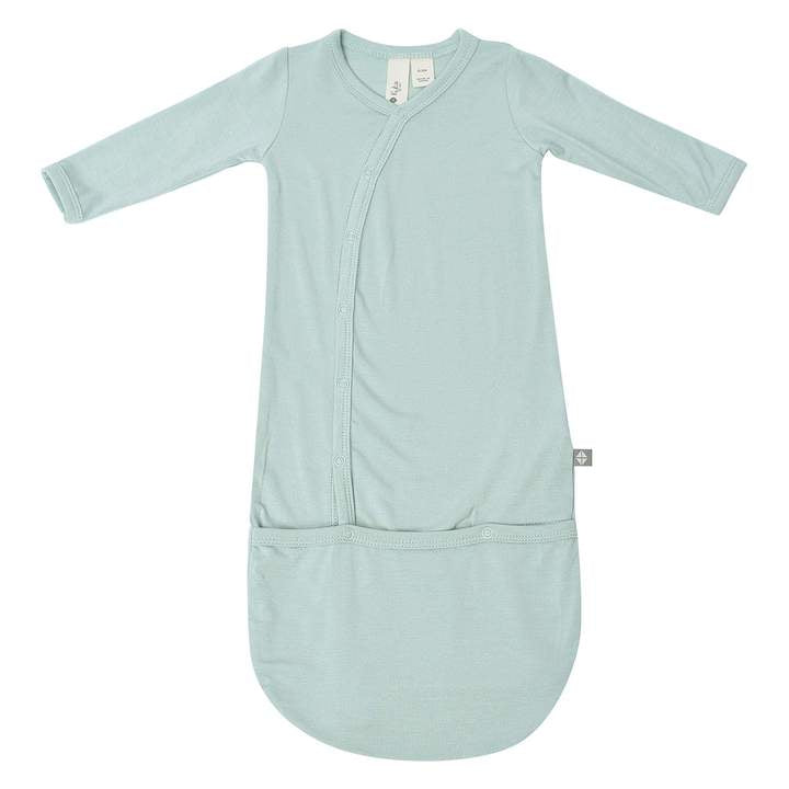 Kyte Baby Sage Bundler for newborns, soft and cozy fleece fabric, featuring a hooded design with zipper closure for comfortable wear.